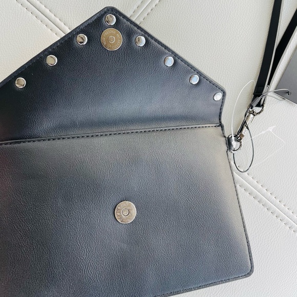 New With Tags
BCBG Pearl + Leather Inspired
Envelope Clutch in
BLACK - Picture 10 of 15